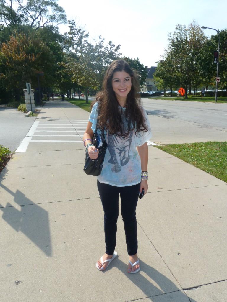 Weinberg freshman Izzie Baum said she put on a colorful collection of clothing because it was summery, but says she would have nixed the velvet pants had she known the weather would be so warm.  