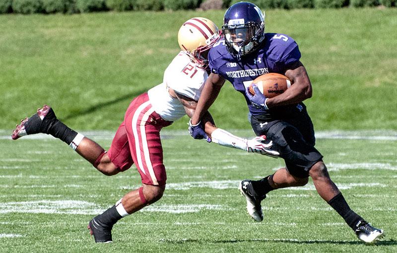 Northwestern running back Venrik Marc dodges a tackle against Boston College on Sept. 15. The Wildcats went on to beat the Eagles 22-13. 