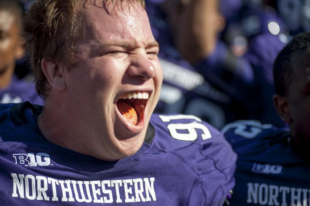 Northwestern defensive tackle Brian Arnfelt celebrates the victory over Indiana, which improved the Wildcats record to 5-0.