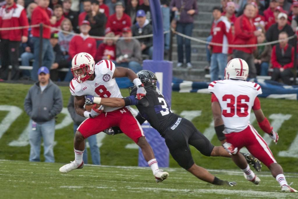 Northwestern cornerback Quinn Evans misses a tackle on Nebraska running back Ameer Abdullah. Abdullah finished with 101 yards on 19 carries. 