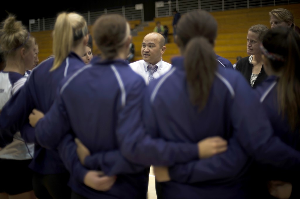 Northwestern coach Keylor Chan addresses his team during a match against Minnesota. The Wildcats are 5-2 on the road this season. 