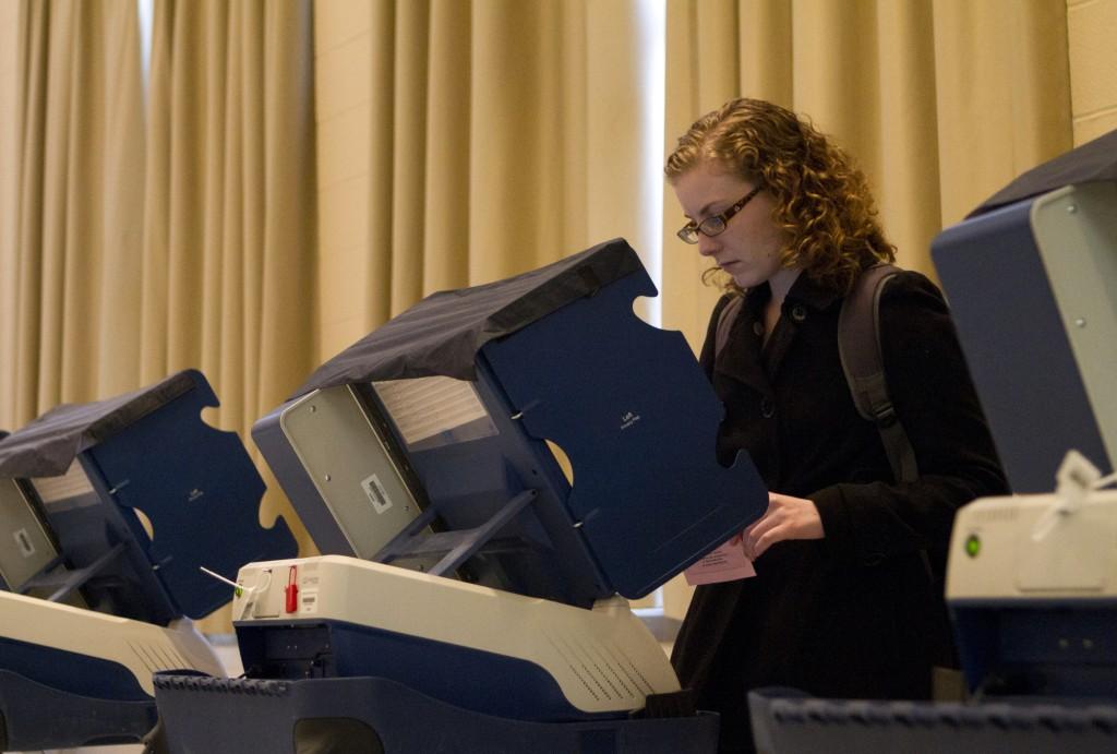 Weinberg sophomore Kayla Hammersmith casts her ballot for the 2012 presidential election last Tuesday in Parkes Hall. It was Hammersmiths first time voting.