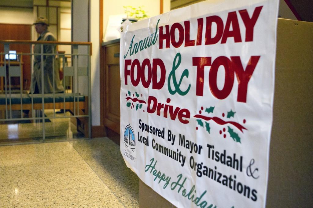 Evanston's annual Holiday Food and Toy Drive, sponsored by the city and local community organizations, has nine drop-off locations, including this spot at the Evanston Public Library on Orrington Avenue. Residents can bring new toys and non-perishable food items to the different drop-off sites or make donations online through Dec. 14. 