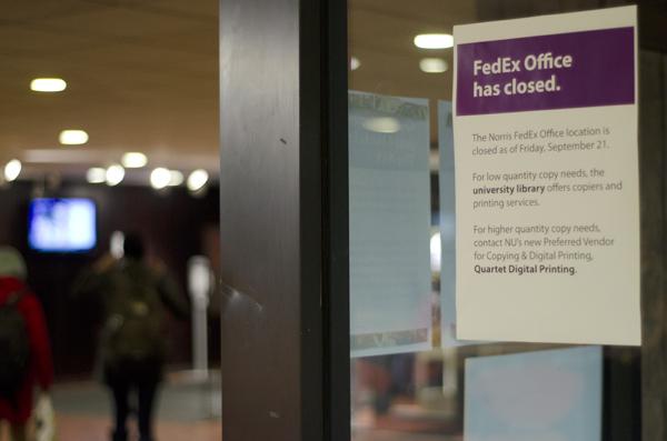 Students walk past the vacated space that was previously the on-campus FedEx location. U.S. Bank will be moving from its current location in Norris to the now vacated space.