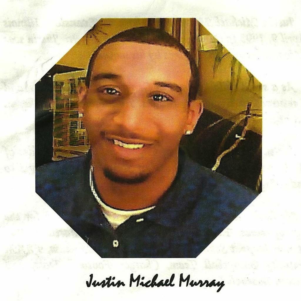 Slain Evanston teenager Justin Murray is pictured in a funeral program distributed Saturday. Justin was affectionately called Babycakes by his mother, according to an obituary in the program.