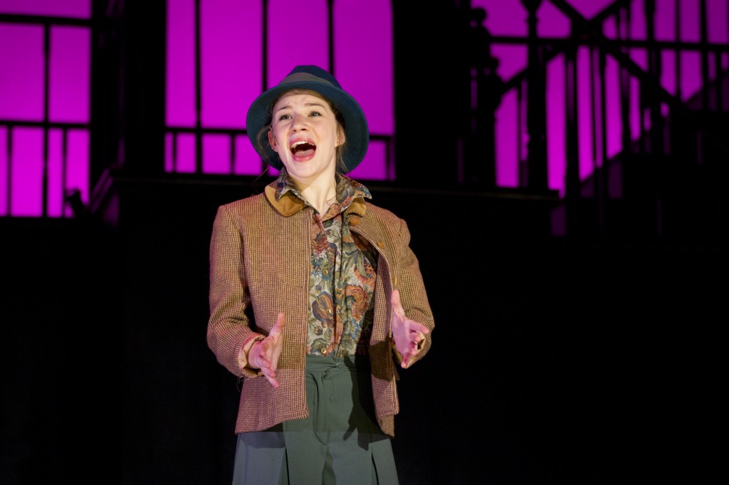 Communication senior Lillie Cummings sings as Eliza Doolittle in the 71st annual Dolphin Show’s production of “My Fair Lady.”