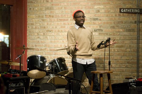 Weinberg sophomore Oluwaseun Ososami, also known as DJ Mufasa the Pilofasa, introduces acts at U NU Arts Night. The program included singing, spoken verse and rapping.