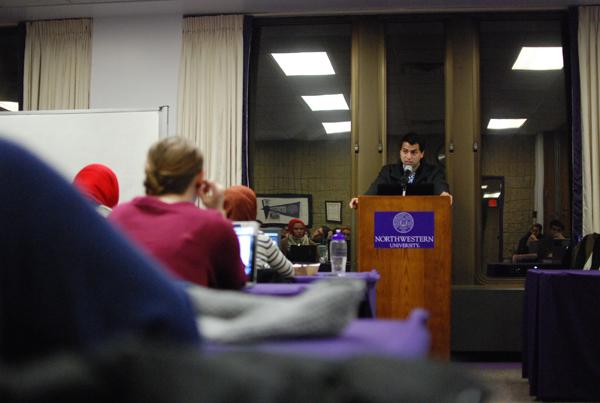 Weinberg senior Girish Pendse presents recommended sanctions on three student groups for violating the Student Activities Finance Committee rules. The vote preceded ASGs discussion of new business regarding wider campus issues including missing  journalist James Foley (Medill 08) and the disaffiliation with Tannenbaum Chabad House.