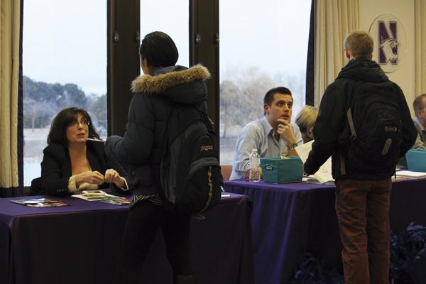 Students speak with landlords and retailers during ASG’s Winter Housing Fair. Representatives were available at Norris for students to gather more information about housing options for next year.