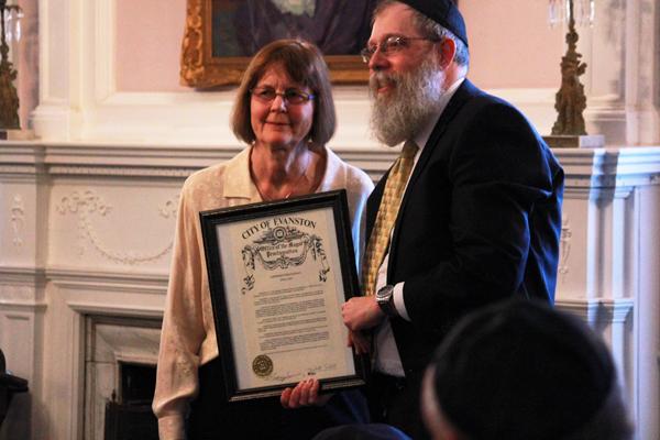 Evanston Mayor Elizabeth Tisdahl and Rabbi Dov Hillel Klein celebrate the 27th anniversary of the Tannenbaum Chabad House. The banquet was held Sunday at the Womans Club of Evanston.