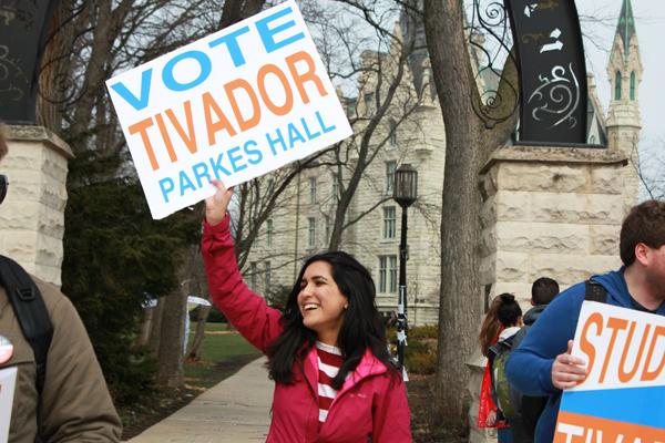 Weinberg freshman Karna Nangia encourages students to vote for 1st Ward challenger Ed Tivador. Students campaigned for Tivador outside the Arch during the voting period.