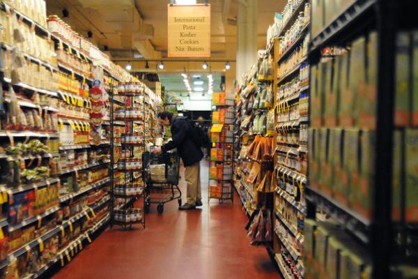 A customer peruses the shelves of Whole Foods Market in Evanston. The grocery store is one of several businesses in Evanston that accepts food stamps.