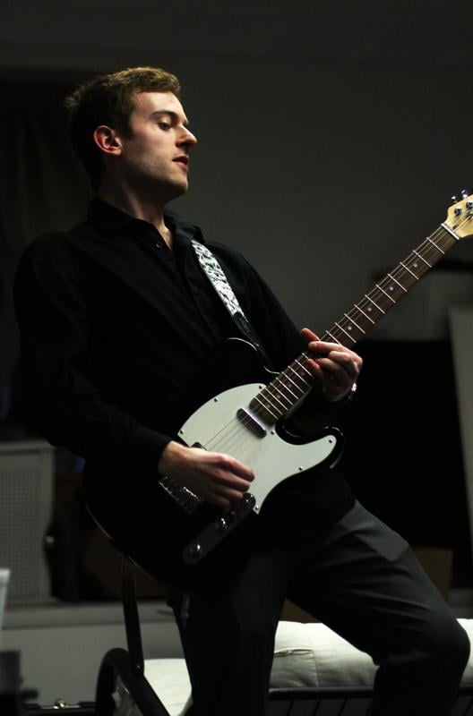 Weinberg senior Evan Bakker, the lead singer of Nebula, also plays guitar for the band, which will play at the upcoming Dillo Day Battle of the Bands.