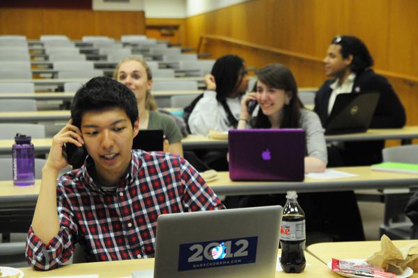 Weinberg freshman Kevin Cheng makes a phone call during the College Democrats phone banking event. The group reached out to local residents in favor of allowing same-sex marriage in Illinois.