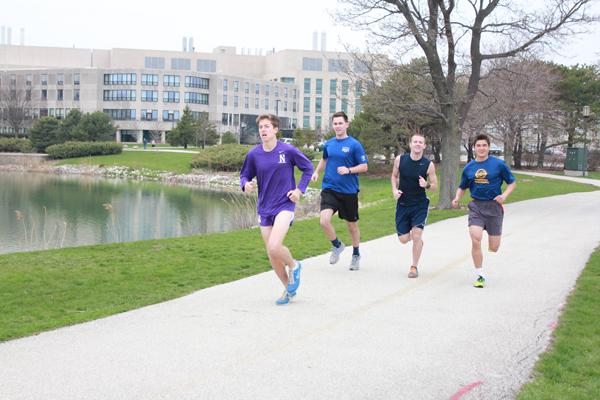 Students run in the Pi Kappa Alpha “Run for Boston” marathon Sunday morning. 