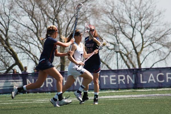 Erin Fitzgerald looks to score on senior day. Fitzgerald led Northwesterns offense this year with 59 goals, while juniors such as Kat DeRonda, Kelly Rich, and Kate Macdonald played supporting roles.