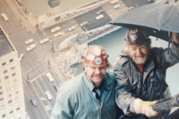 Michael Kerr and his older brother Patrick Kerr take a break from working at a Chicago construction site in an undated photo. Patrick Kerr came out of retirement in the late 2000s and worked alongside his younger brother.