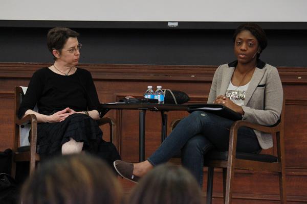 Tiffany Rice (right), mother of slain Evanston teen Dajae Coleman, speaks about her work to end violence, along with Anya Cordell (left). Rice and Cordell, another community activist, shared with the audience their plans to reduce violence and bigotry in the community Tuesday evening in Harris Hall.