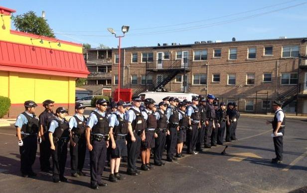Evanston and Chicago police met Friday evening near the two cities border for a joint roll call. More than two dozen officers showed up.