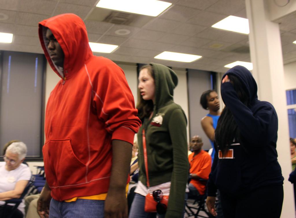 A group of 20 Evanston teens and children walk into the chamber wearing hooded sweatshirts at Mondays City Council meeting. The young people were organized in protest of George Zimmerman’s acquittal in the shooting death of Trayvon Martin.