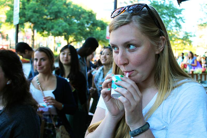 McCormick junior Margaret Kirk samples a chocolate milkshake from Edzos Burger Shop, 1571 Sherman Ave. The burger shop offered fries and shakes for the event.
