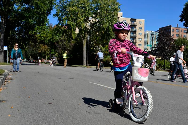 A young girl rides down Ridge Avenue during Bike the Ridge. The annual event was held on Sunday between 9 a.m. and 1 p.m. and attracted many families.  