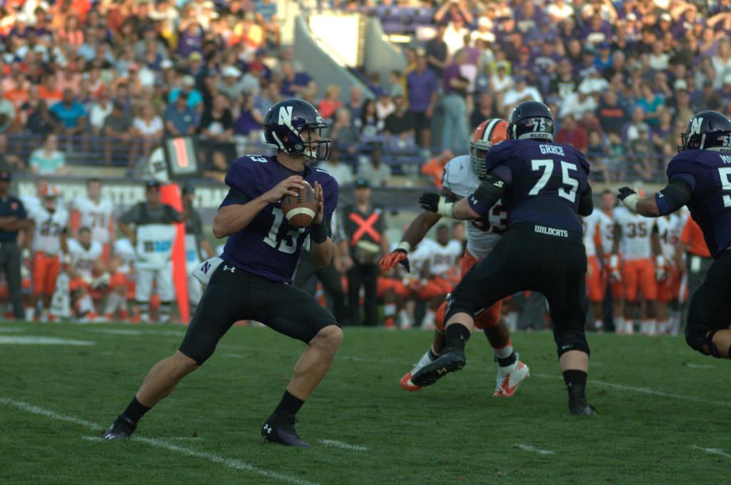 Junior quarterback Trevor Siemian drops back to pass. Siemian combined with senior Kain Colter to throw for 375 yards Saturday.