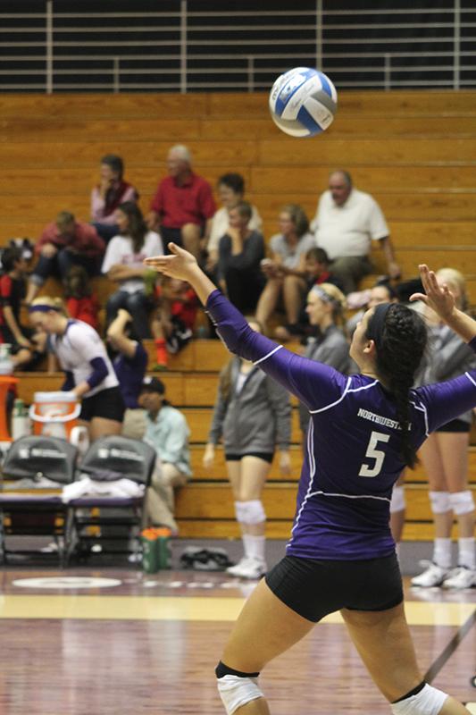 Redshirt sophomore Caroline Niedospial serves the ball during the Wildcat Classic last weekend. The libero heads Northwestern’s defense with 4.49 digs per set and leads the team with 15 service aces.
