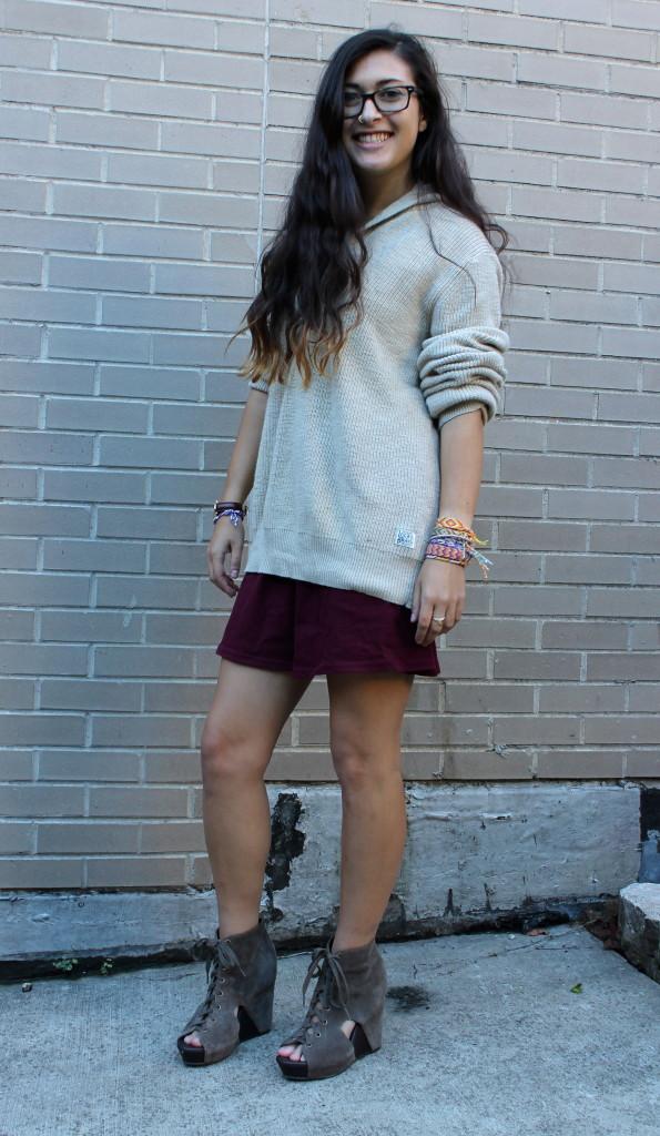 Alix Kramer takes the male Lucky Brand sweater and pairs it with a dress and 
wedges.