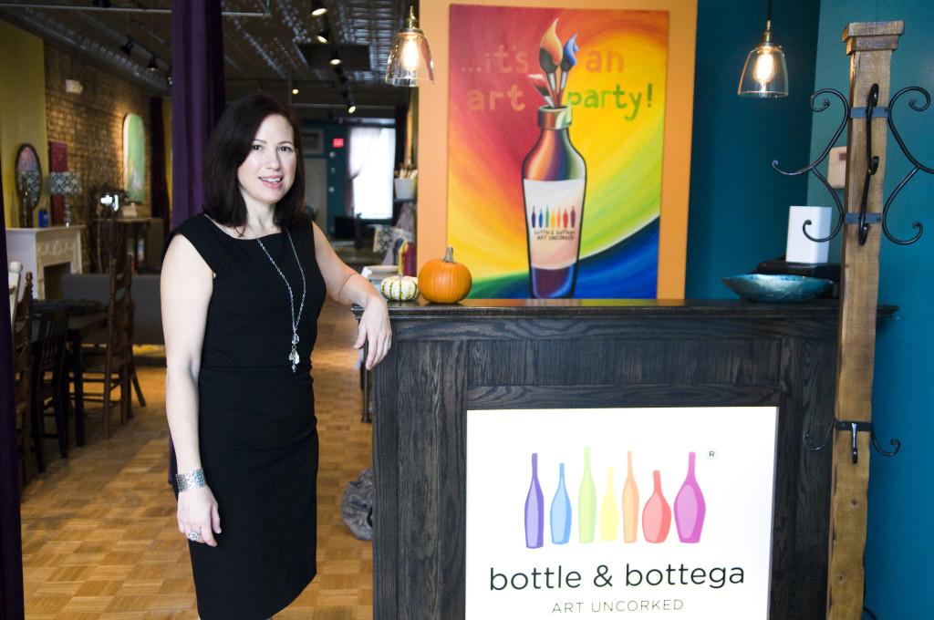 Lynette Martin owns Evanston’s new Bottle & Bottega store, which features art 
opportunities for all ages. Customers bring their own wine to sip as they create artwork. 