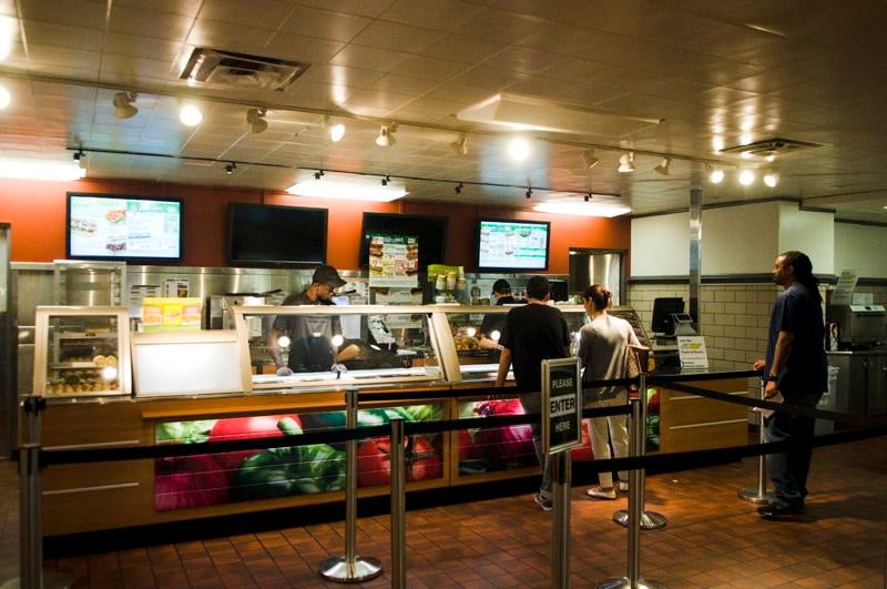 Students order their sandwiches at the new Subway location in Norris University Center. The store opened Thursday and is the 11th Subway location in Evanston.
