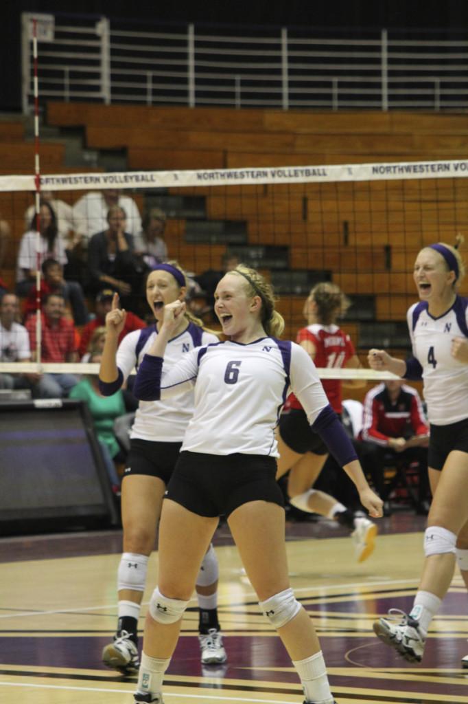 Freshman setter Caleigh Ryan celebrates with her teammates during the Wildcat Classic in September. Northwestern defeated both Indiana and Purdue in five-set thrillers on the road this weekend. Ryan received the Big Ten Freshman of the Week award for her efforts.
