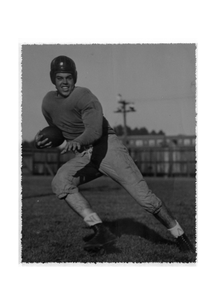Football player in leather helmet in 1940s