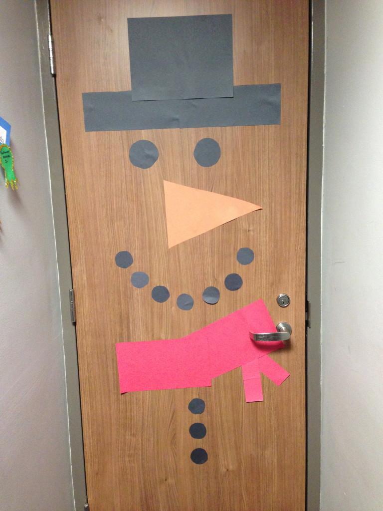 Turn your door into a Frosty one with some paper.