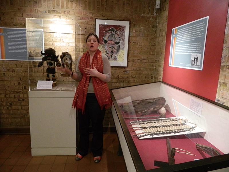 Melissa Halverson explains the historical significance of the water buffalo in Native American storytelling. The Mitchell Museum of the American Indian launched a new exhibit Saturday. 