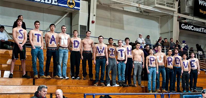 Members of Wildside, the Northwestern student section, painted their chests in solidarity with Purdue in light of a shooting on Purdue’s campus Tuesday. The Wildcats defeated the Boilermakers 63-60 at Welsh-Ryan Arena.
