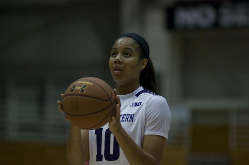 Freshman forward Nia Coffey prepares to shoot. Coffey, along with classmate Christen Inman, had several strong performances over Winter Break, helping lead the Wildcats to victories over IUPUI and Northeastern. 