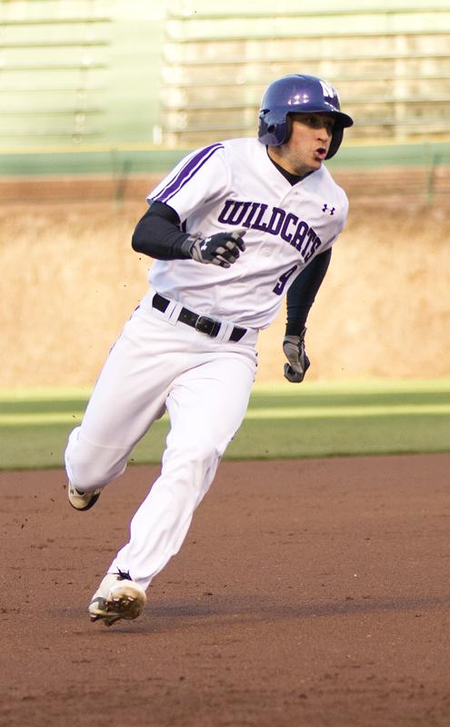 Senior utility player Kyle Ruchim rounds second. Ruchim, who was Northwestern’s best hitter in 2013 with a batting average of .365, is abandoning his pitching career to focus on batting. 