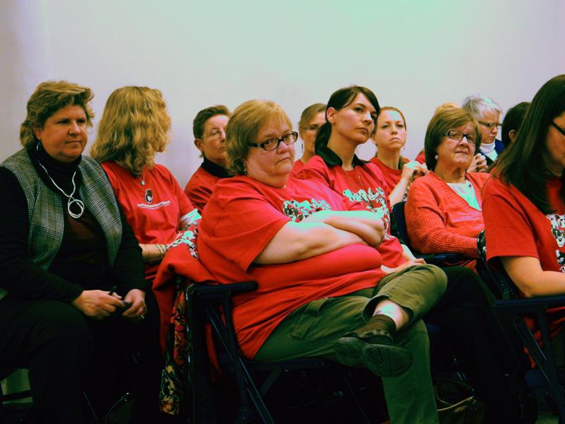 Community Animal Rescue Effort volunteers listen during Evanston’s Human Services Committee meeting Monday night. The shelter’s management and future operation were topics of discussion during the meeting.
