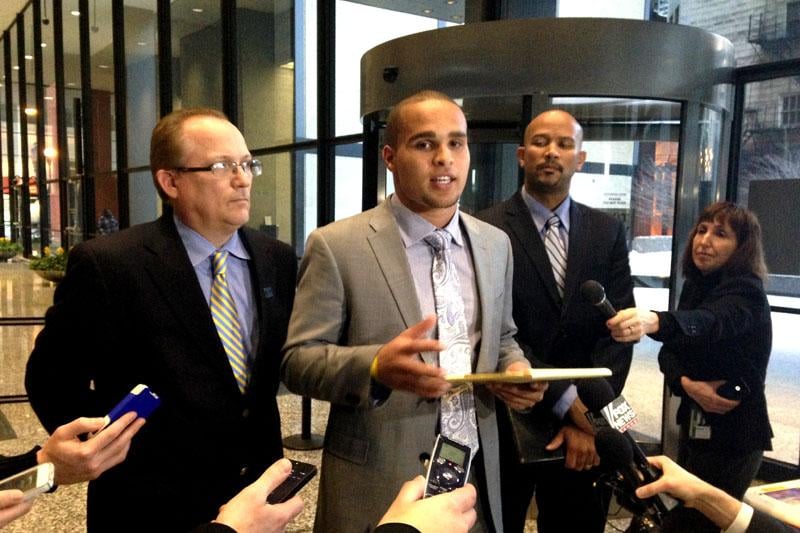Former Northwestern quarterback Kain Colter — standing with National College Players Association president Ramogi Huma and United Steelworkers political director Tim Waters — addressed the media Tuesday after answering questions from attorneys for more than six hours at a National Labor Relations Board hearing. 
