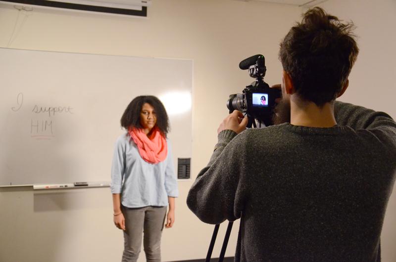 Communication senior Itai Joseph films a student on Feb. 12 for a video produced by Northwestern Men Against Rape and Sexual Assault. MARS released the “I Support Survivors” video to demonstrate its support for sexual assault victims on campus.