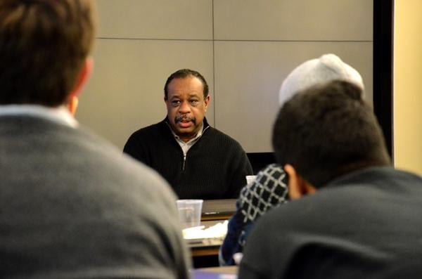 Henry Perkins, a psychologist at CAPS, speaks about support services for minority students Monday evening at a panel in Annenberg Hall. The panel also featured representatives from CARE and the department of Religious Life.