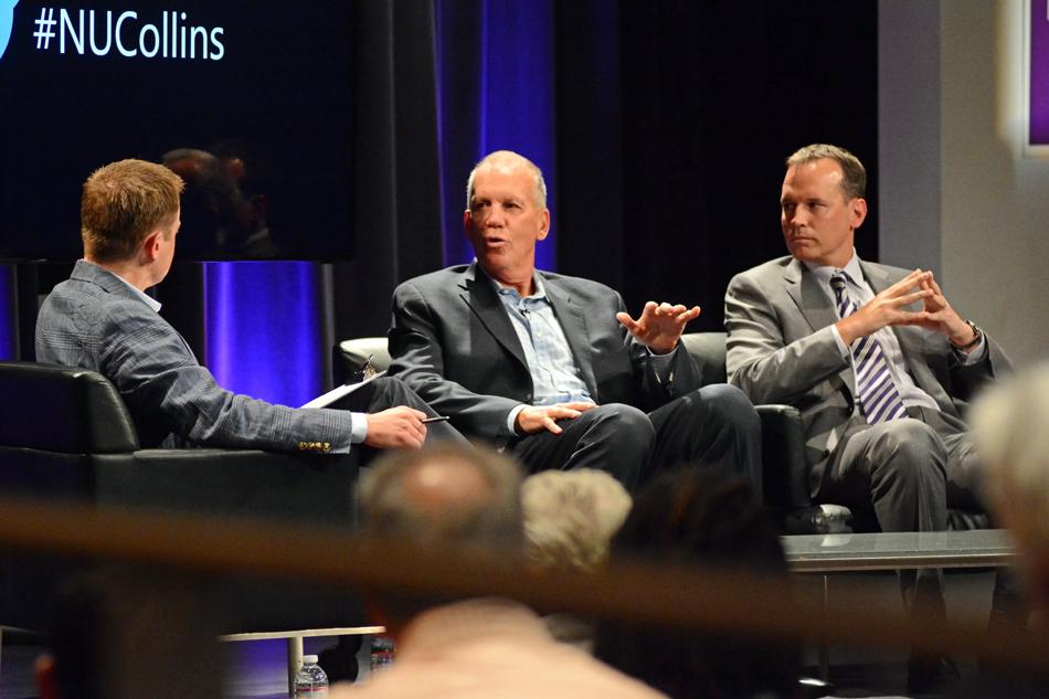  Doug Collins speaks at the McCormick Tribune Center Forum on Tuesday evening as his son Chris looks on. The Collins talk was part of Medill’s “Beyond the Box Score” sports media lecture series. 