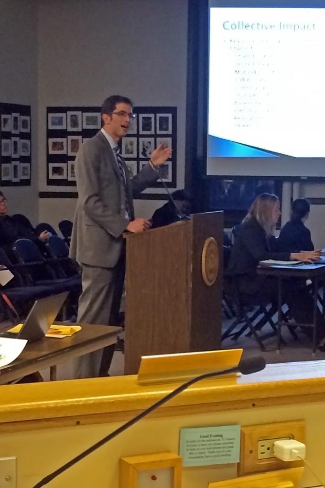 Seth Green, the executive director of the Youth Organizations Umbrella, presents before City Council on Monday night on the long-term education initiative Cradle to Career. Aldermen voted to move discussion regarding council supporting the effort to the Human Services Committee.