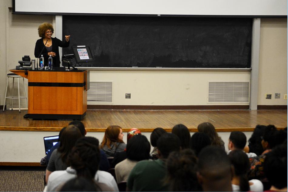 Angela Davis interacts with audience members during her talk at Fisk Hall Monday night. Davis discussed a variety of topics during the presentation, including her work in the anti-prison movement. 