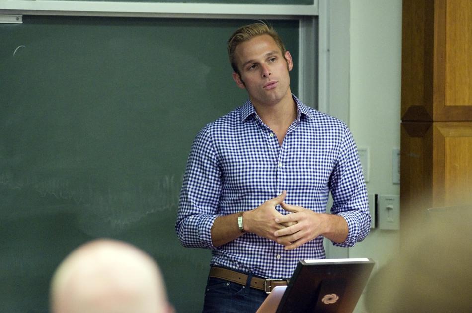 Swimmer Michael Holtz addresses students at Annenberg Hall Thursday night. Rainbow Alliance sponsored the talk by Holtz, who is openly gay, as its Spring Speaker.