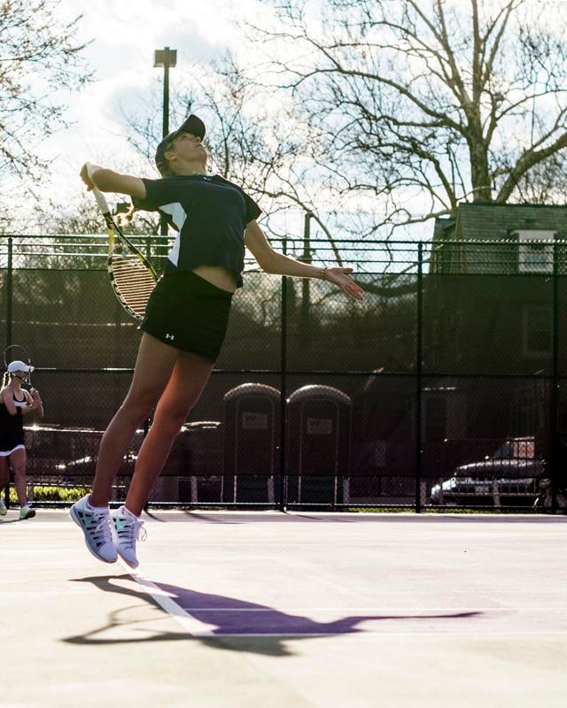 Northwestern’s Veronica Corning prepares to rip off a serve. The senior plans to take her talents to the pro circuit following her time in summer school.