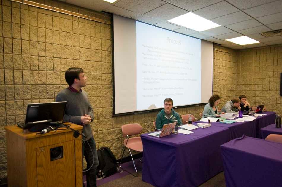 McCormick senior Alex Van Atta, Associated Student Government student groups vice president, discusses the funding process at the Senate meeting Wednesday. ASG confirmed the 2014-2015 Operating Budget, which added funds for students with financial need and a new Wild Ideas Fund. 