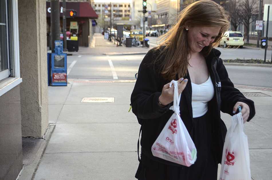 Rising Weinberg freshman Jessica Hoffman uses plastic bags after a trip to the drug store. Aldermen voted Monday to continue discussion on the possibility of a plastic bag ban in Evanston.  