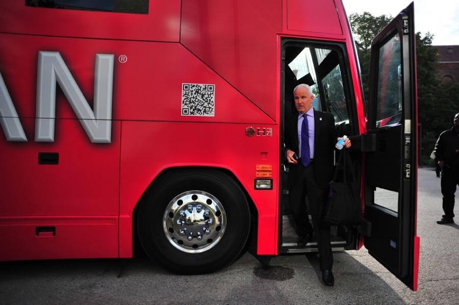 University president Morton Schapiro leaves the CSPAN bus Wednesday morning. Schapiro’s interview touched on NU’s historically high tuition and historically low admission rate, as well as the school’s relationship with the rest of the Big Ten conference.